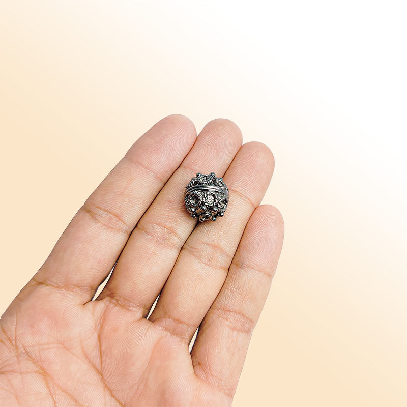 Handcrafted black rhodium copper bead from India with decorative round design for jewelry making