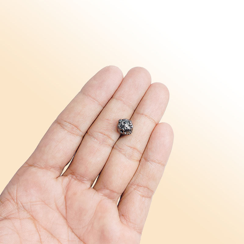 Handcrafted black rhodium overlay copper round bead from India with spiral texture for jewelry making