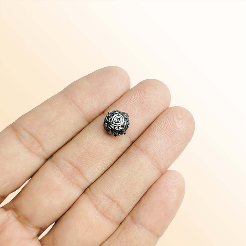 Handcrafted black rhodium overlay copper round bead from India with spiral texture for jewelry making