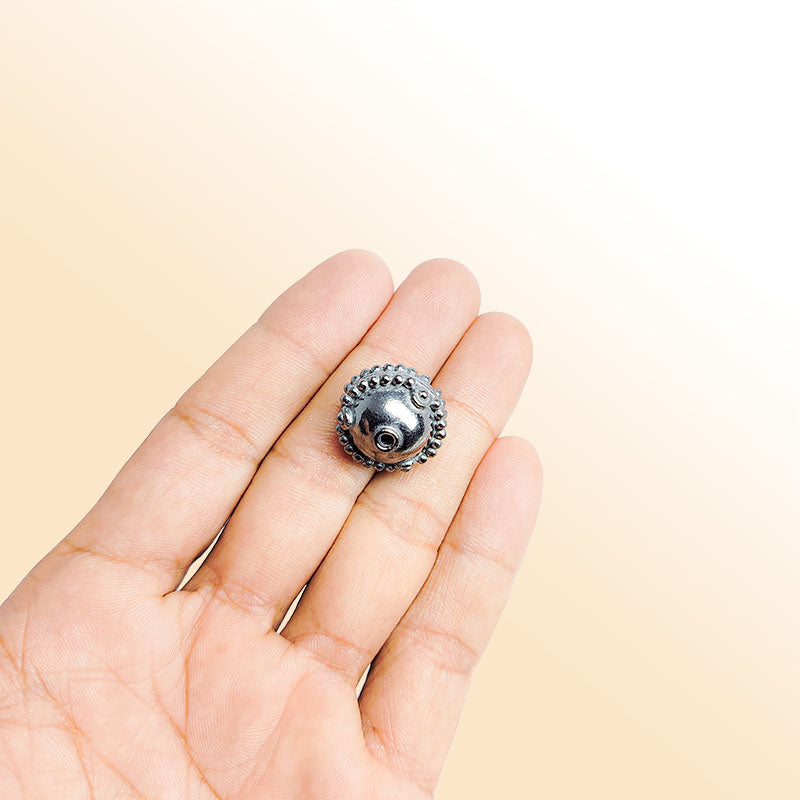 Handcrafted black rhodium bead from India with textured spherical design for modern jewelry making
