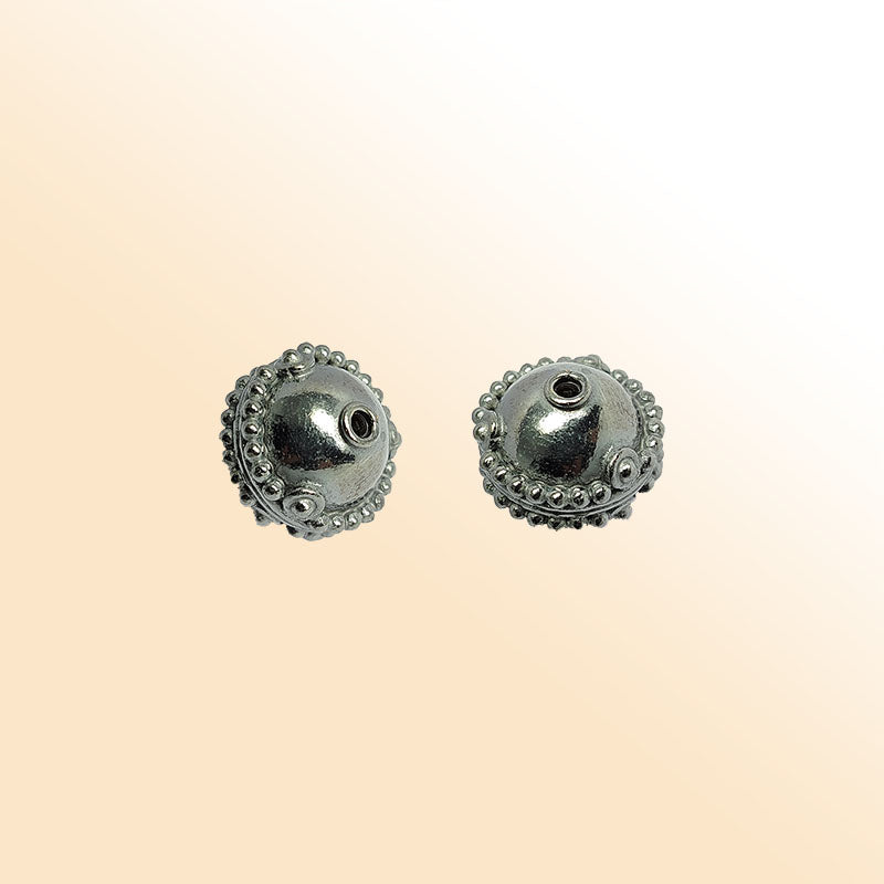 Handcrafted black rhodium bead from India with textured spherical design for modern jewelry making