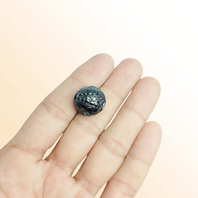Black rhodium overlay copper round bead handcrafted in India with antique dotted texture