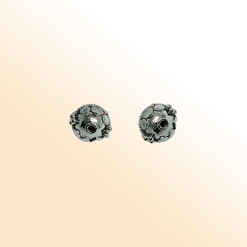 Vintage black rhodium bead from India featuring detailed handcrafted beaded texture