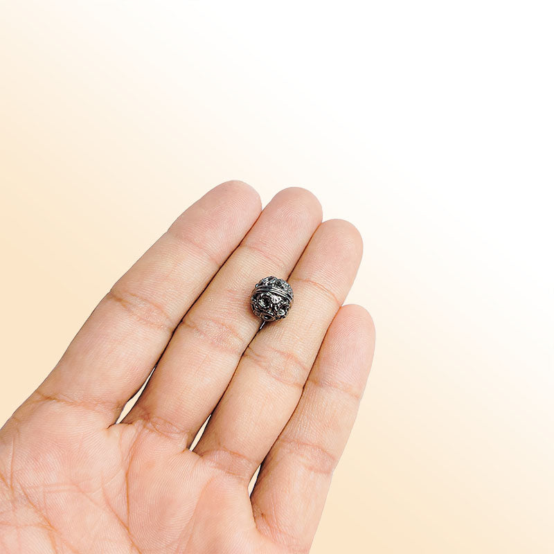 Black rhodium rope-style round bead handcrafted in India with detailed texture for jewelry making.