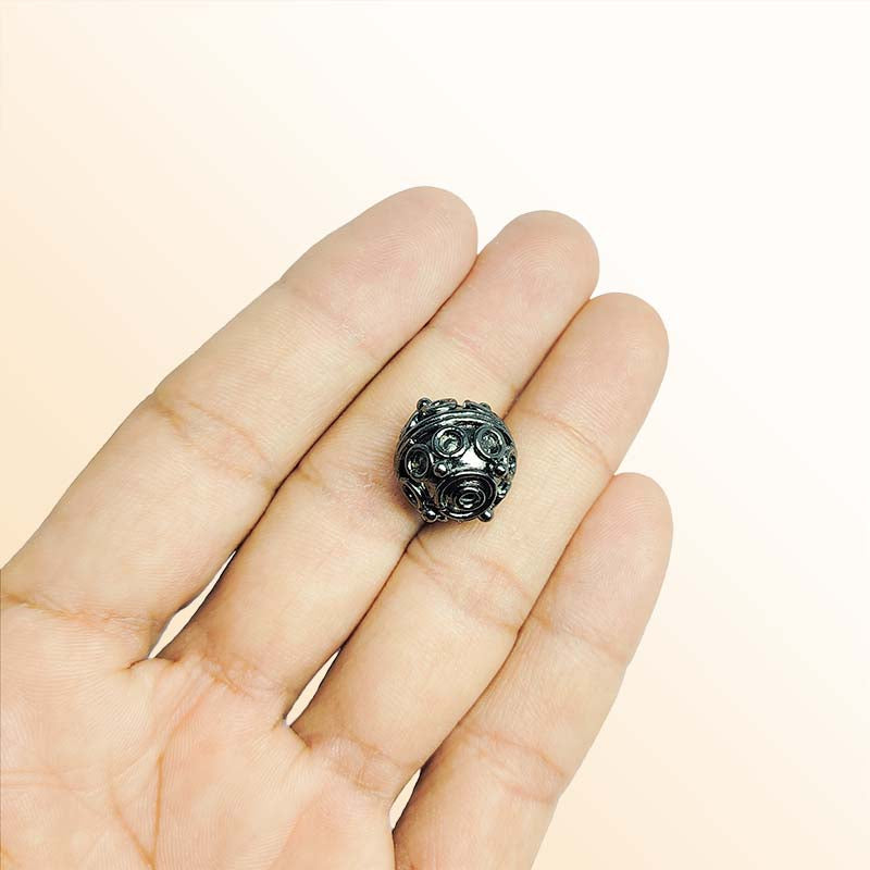 Handcrafted black rhodium overlay copper round bead from India with Bali style detailing for jewelry making