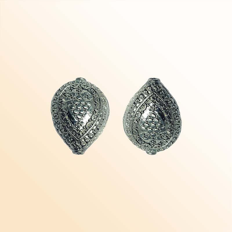 Handcrafted black rhodium overlay over copper bead with bold textured design made in India