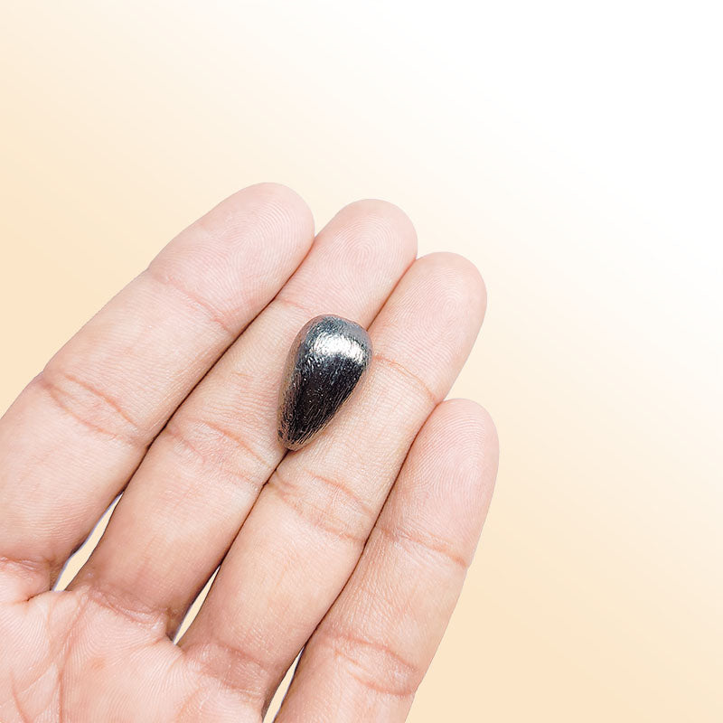 Handcrafted black rhodium overlay copper teardrop bead from India for jewelry making