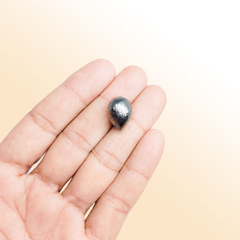 Handcrafted black rhodium overlay copper teardrop bead from India for jewelry making