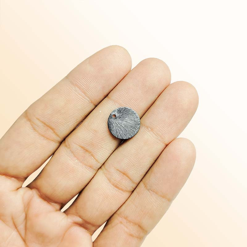 Handcrafted black rhodium overlay copper round charm from India for jewelry making
