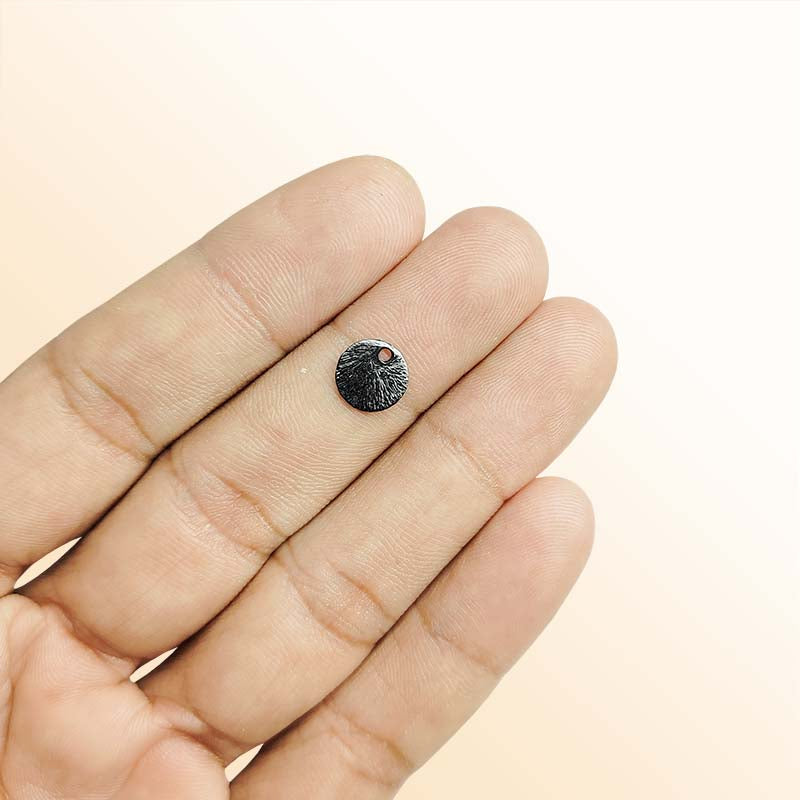 Handcrafted black rhodium overlay copper round charm from India for jewelry making