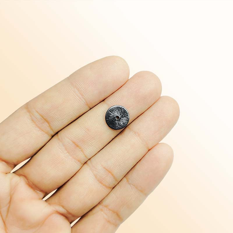 Handcrafted black rhodium overlay copper round charm from India for jewelry making