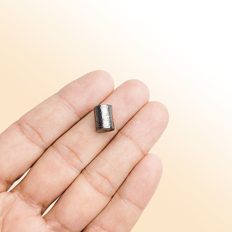 Handcrafted black rhodium overlay copper textured barrel bead from India with radial brushed finish