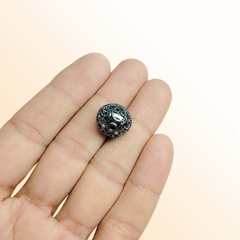 Handcrafted black rhodium overlay copper ornate rope center round bead from India with vintage swirl texture