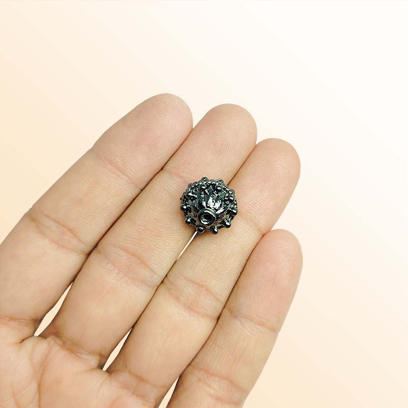 Handcrafted black rhodium overlay copper floral dome round bead from India with vintage textured design