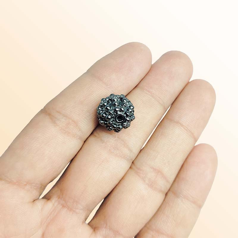 Handcrafted black rhodium overlay copper granulated round bead from India with antique dotted texture