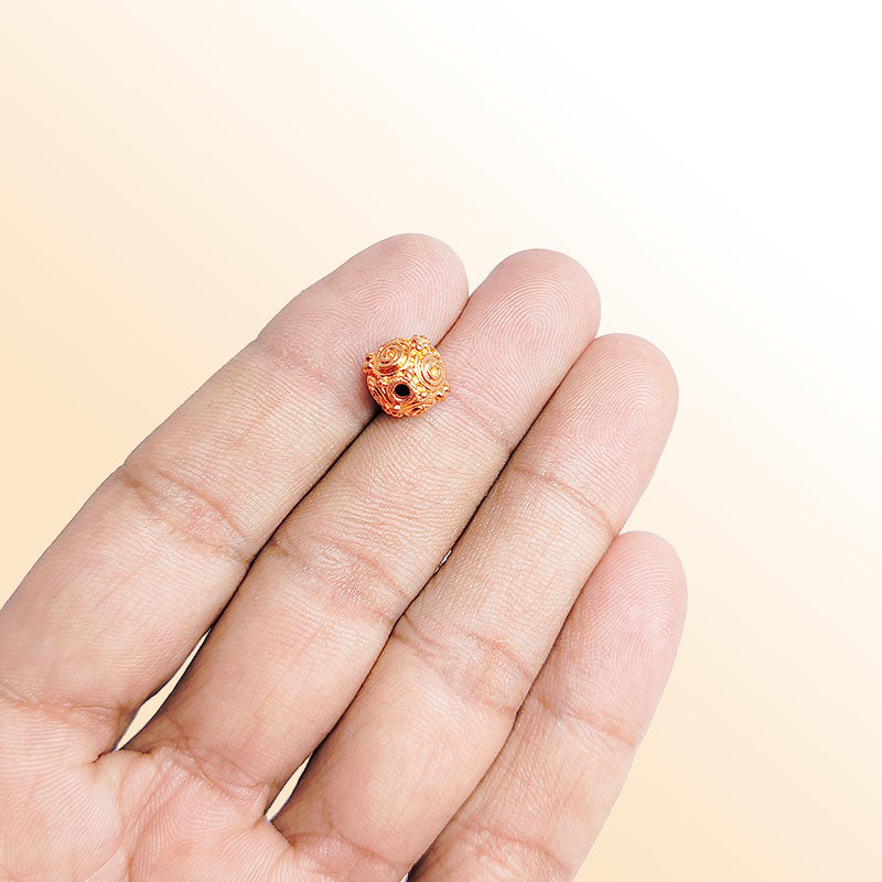 Artisan rose gold overlay copper spiral bead handcrafted in India for jewelry designs
