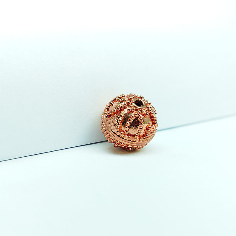 Textured rose gold overlay copper granulated bead handcrafted in India for jewelry designs
