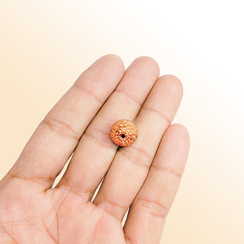 Textured rose gold overlay copper circular bead handcrafted in India for jewelry designs