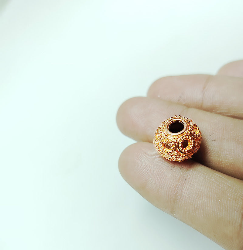 Textured rose gold overlay copper granulated medallion bead handcrafted in India for jewelry designs