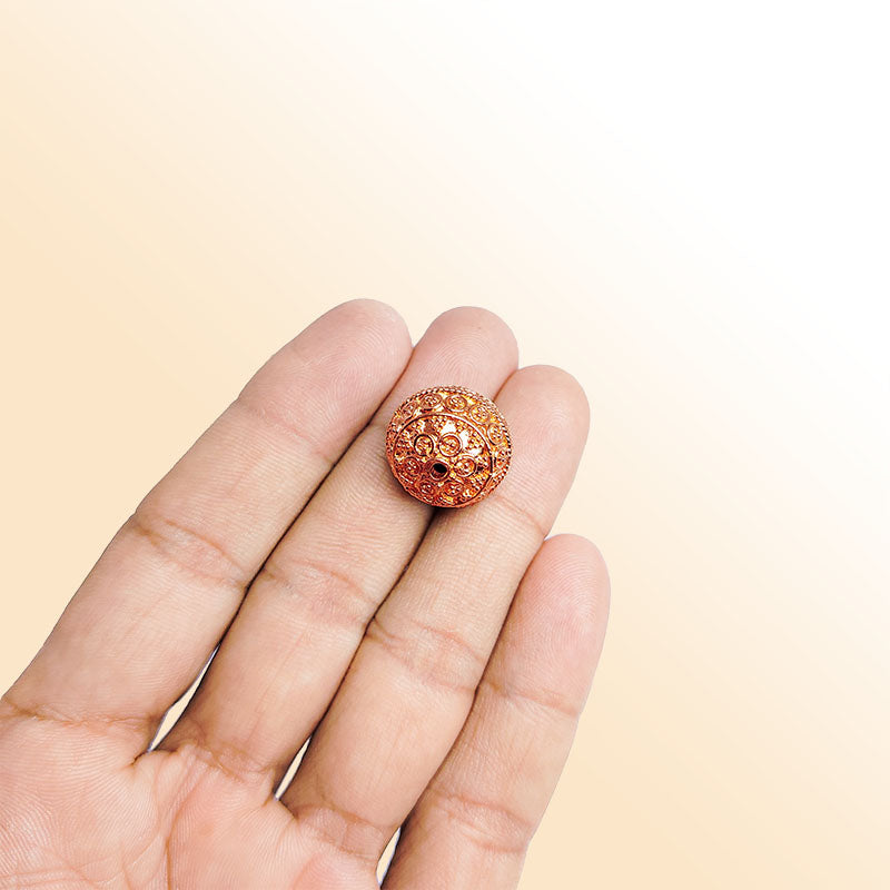 Rose gold overlay copper round filigree bead handcrafted in India for elegant jewelry designs