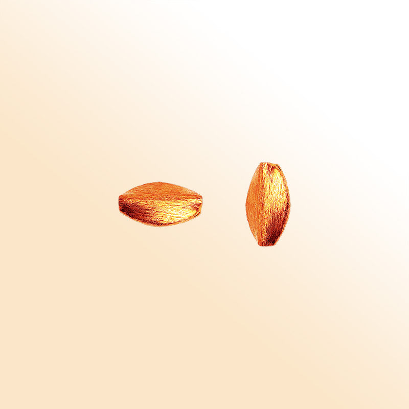 Handmade rose gold oval bead with textured finish crafted in India for jewelry designs