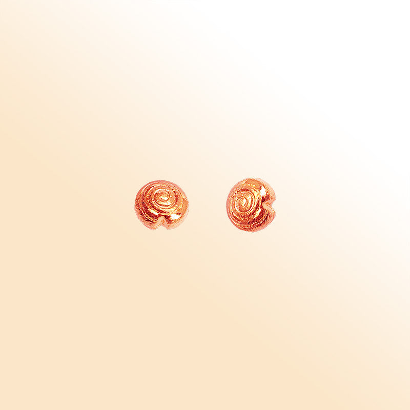 Handcrafted rose gold overlay copper spiral charm made in India with polished finish