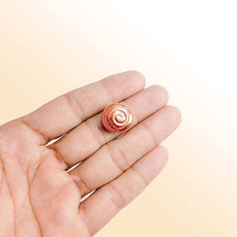 Handcrafted rose gold overlay copper spiral charm made in India with polished finish