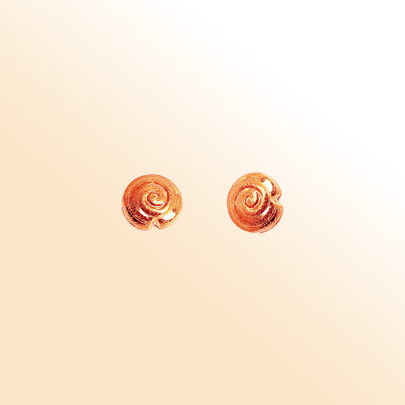 Handcrafted rose gold overlay copper spiral charm made in India with polished finish