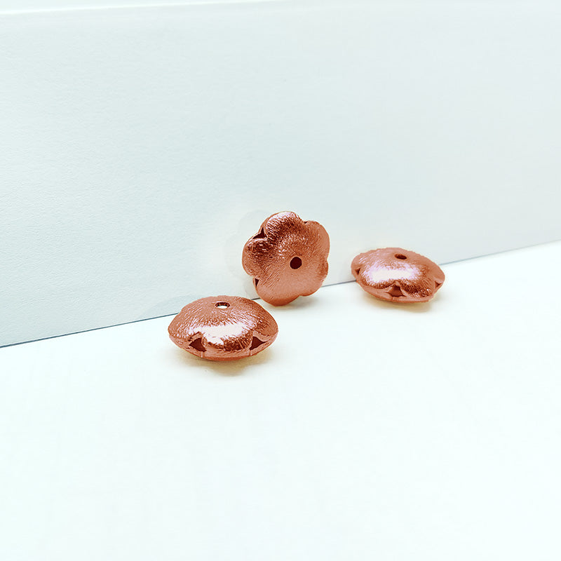 Handcrafted rose gold overlay copper flower accent made in India with brushed finish
