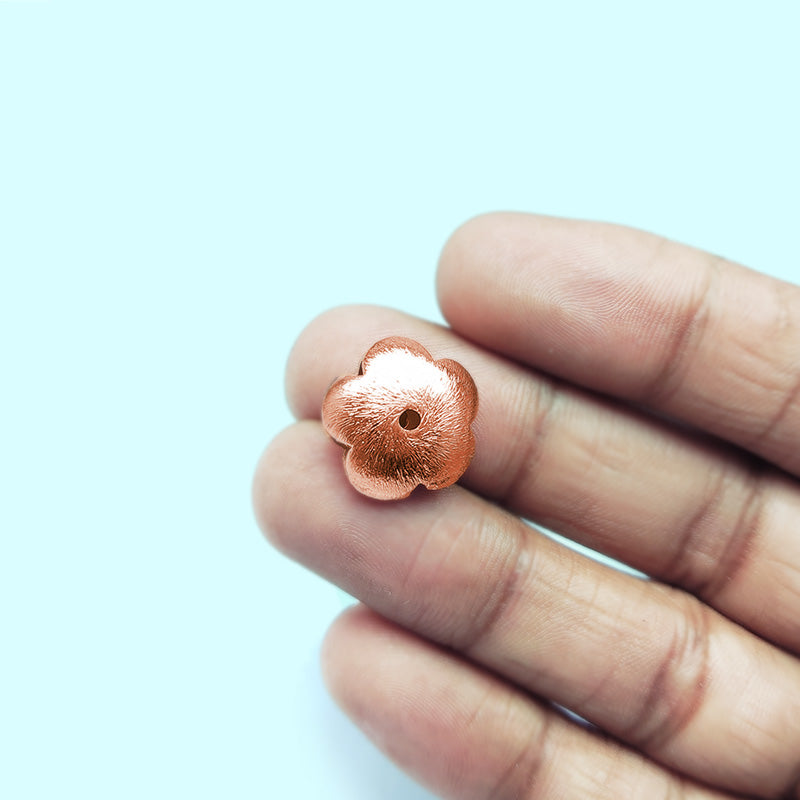 Handcrafted rose gold overlay copper flower accent made in India with brushed finish