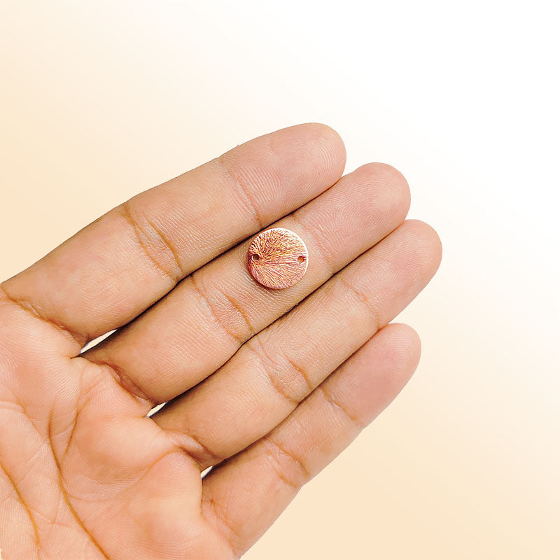 Handcrafted rose gold overlay copper round connector disc made in India with textured finish