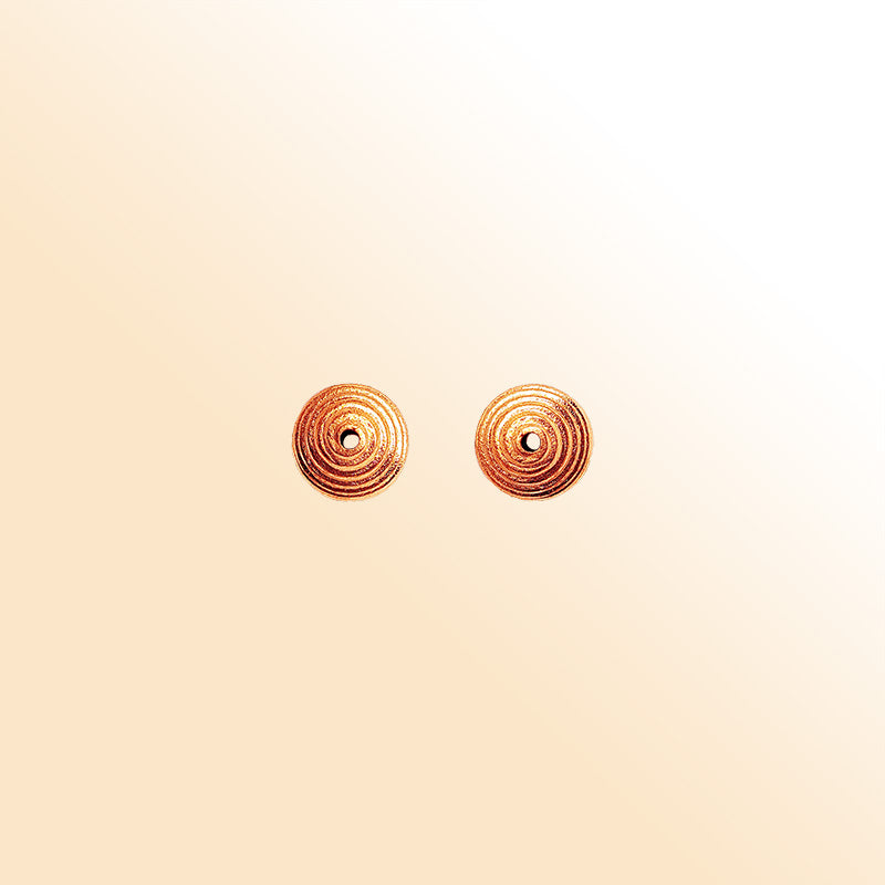 Handcrafted rose gold overlay copper ribbed round bead made in India with brushed finish