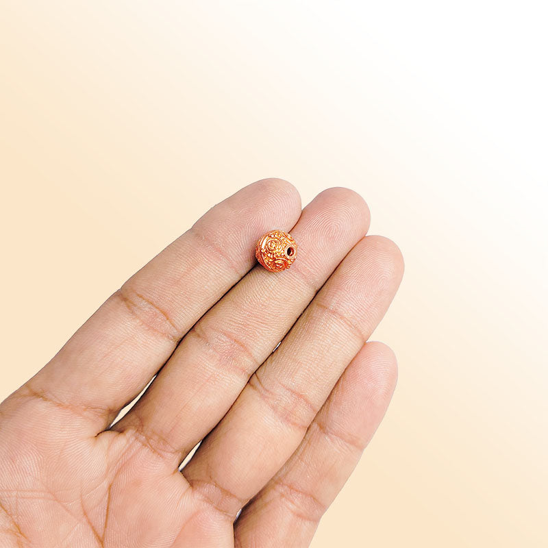 Handcrafted rose gold overlay copper spiral round bead made in India with textured finish