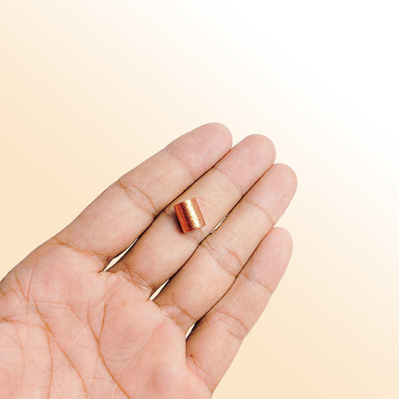 Rose Gold artisan cylinder bead handcrafted in India with textured copper finish for jewelry making