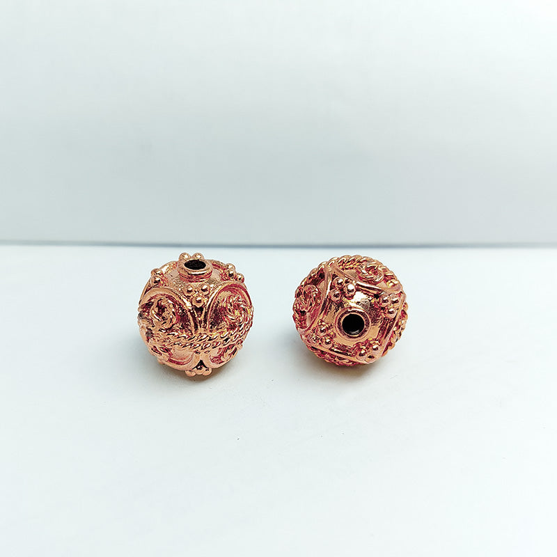Ornate rose gold overlay copper bead handcrafted in India for retail jewelry making