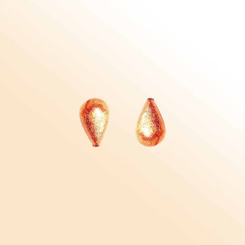 Rose gold overlay copper teardrop bead handcrafted in India for retail jewelry making