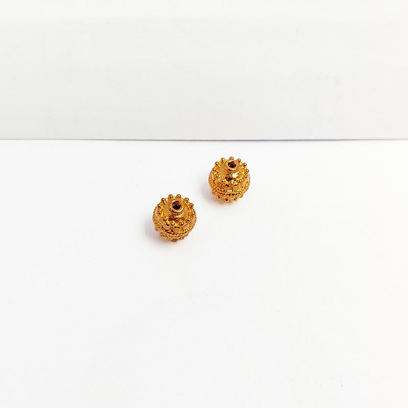 Rose gold ornate round copper bead 8 mm handcrafted in India with dotted texture and polished finish