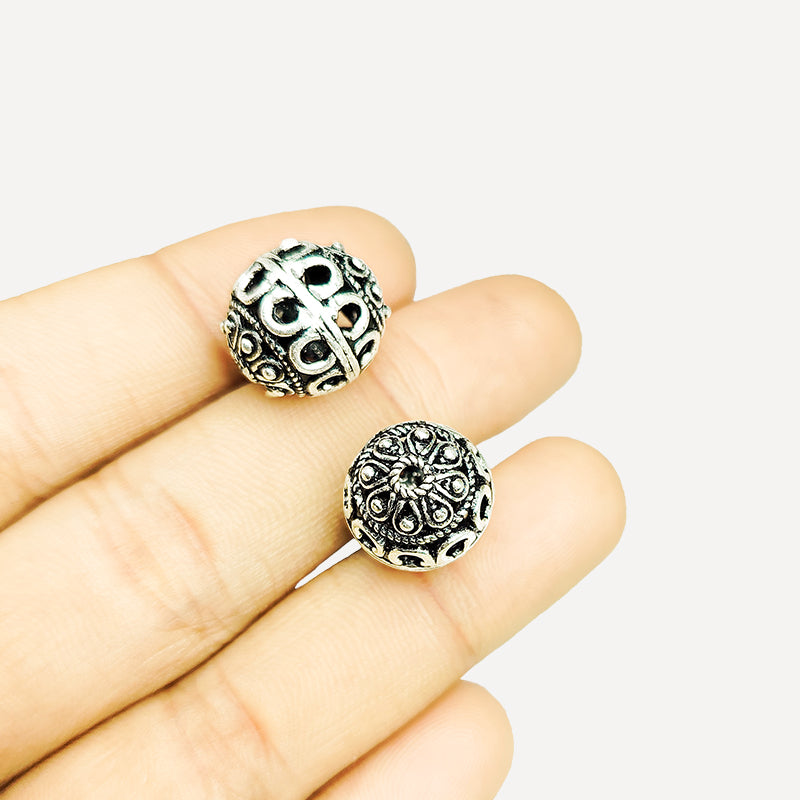 Silver ornate hollow copper bead handcrafted in India with openwork design and antique finish