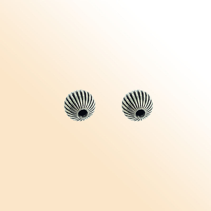 Silver ribbed round copper bead handcrafted in India with antique finish and textured surface
