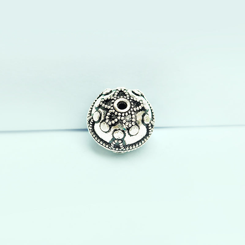 Silver ornate dome copper bead handcrafted in India with raised motifs and antique finish