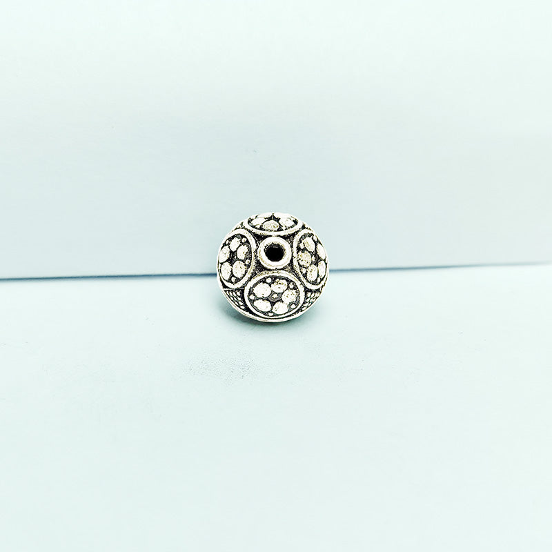 Silver floral panel round copper bead handcrafted in India with antique finish and textured detailing