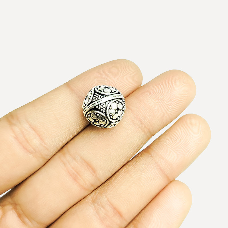 Silver floral panel round copper bead handcrafted in India with antique finish and textured detailing