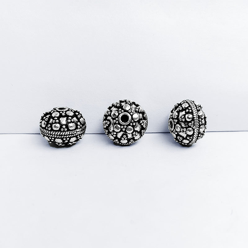 Silver studded disc copper bead handcrafted in India with antique finish and textured detailing