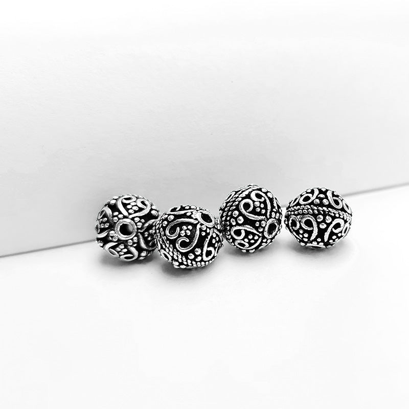 Handcrafted silver overlay bead from India featuring an antique engraved design for elegant jewelry creations.