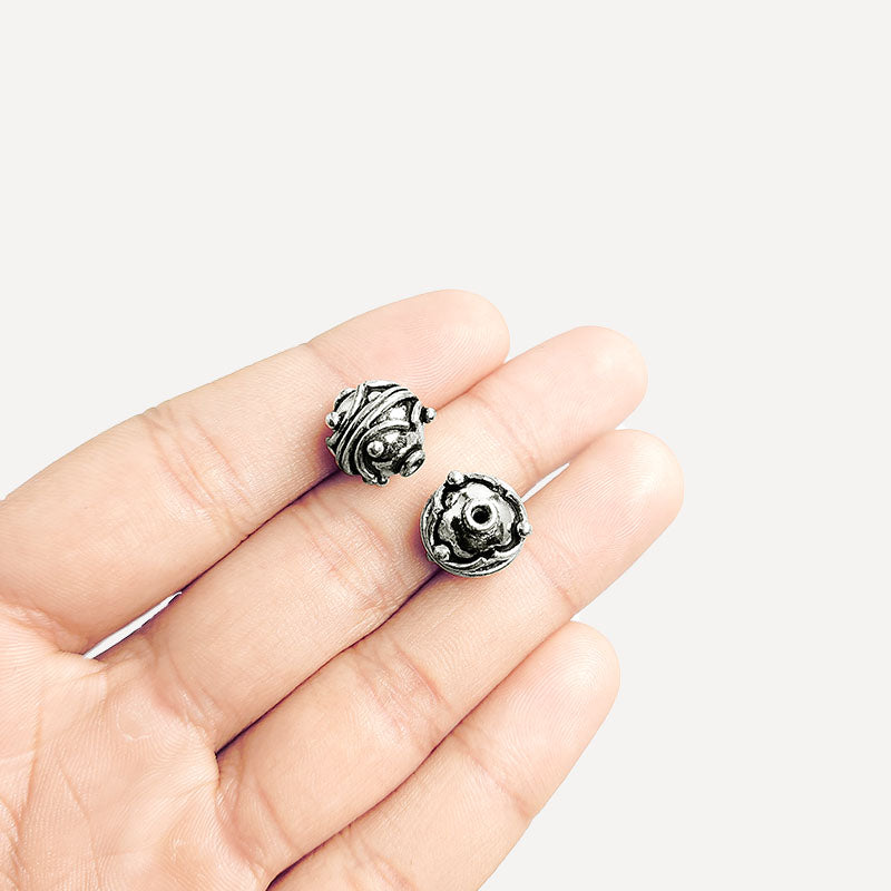 Handcrafted silver overlay round bead from India featuring antique raised dot detailing for jewelry making.