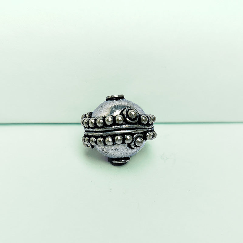 Handcrafted silver overlay decorative bead from India with oxidized finish and beaded round design for retail jewelry making