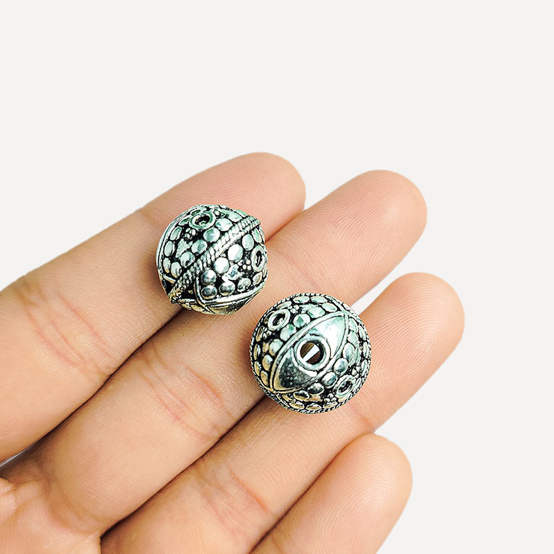 Handcrafted silver overlay round bead from India with oxidized finish and engraved decorative design for retail jewelry making