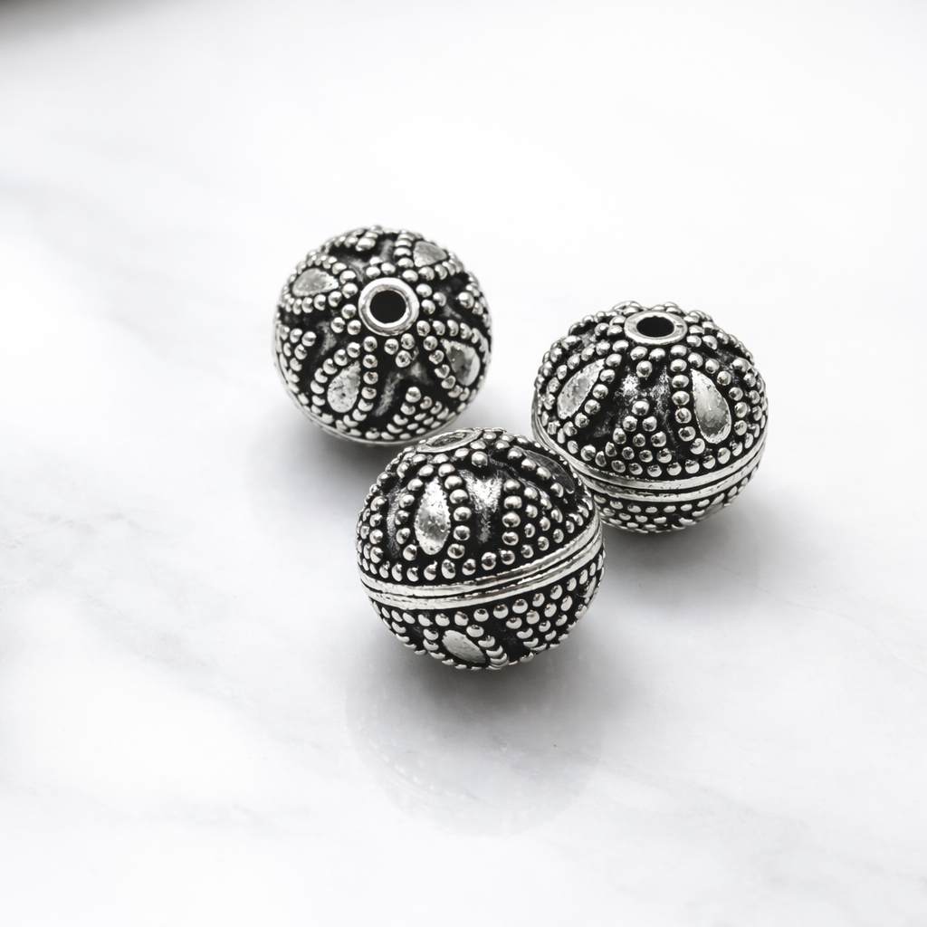 Handcrafted silver overlay floral filigree bead from India with oxidized finish for retail jewelry making