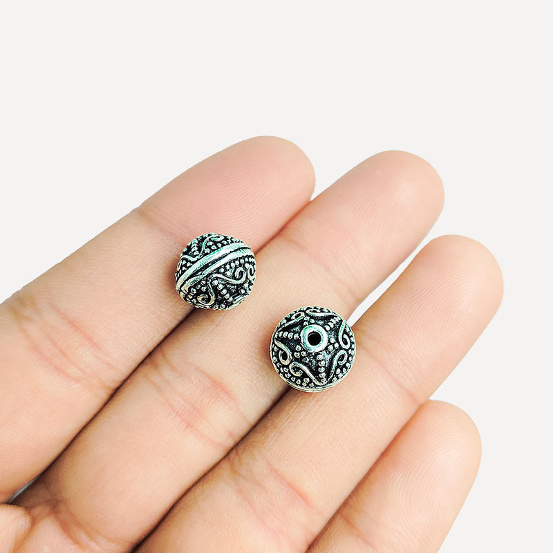 Handcrafted silver overlay scroll design round bead from India with oxidized finish for retail jewelry making