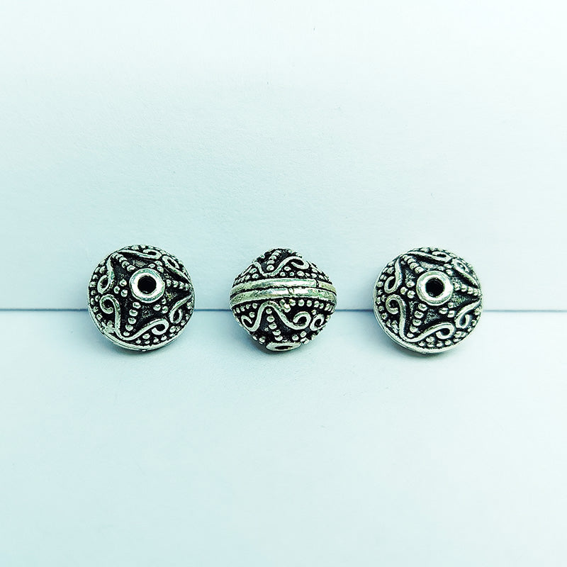 Handcrafted silver overlay scroll design round bead from India with oxidized finish for retail jewelry making